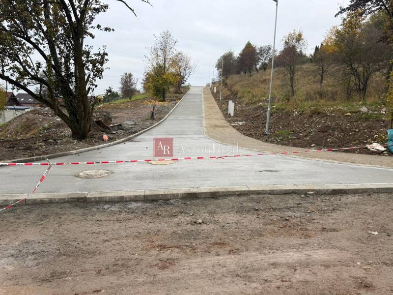Building plot in Podbreziny Háje in Liptovský Mikuláš with a newly completed road.