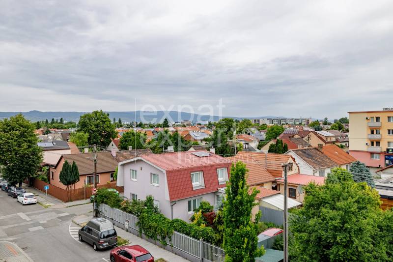 View of the rooftops and greenery from Pri strelnici street in Bratislava - Ružinov.