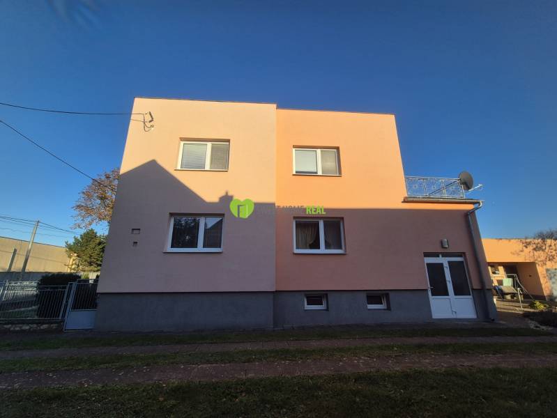 A family house on Kpt. Nálepku Street in Trebišov with a pink facade and a garden.
