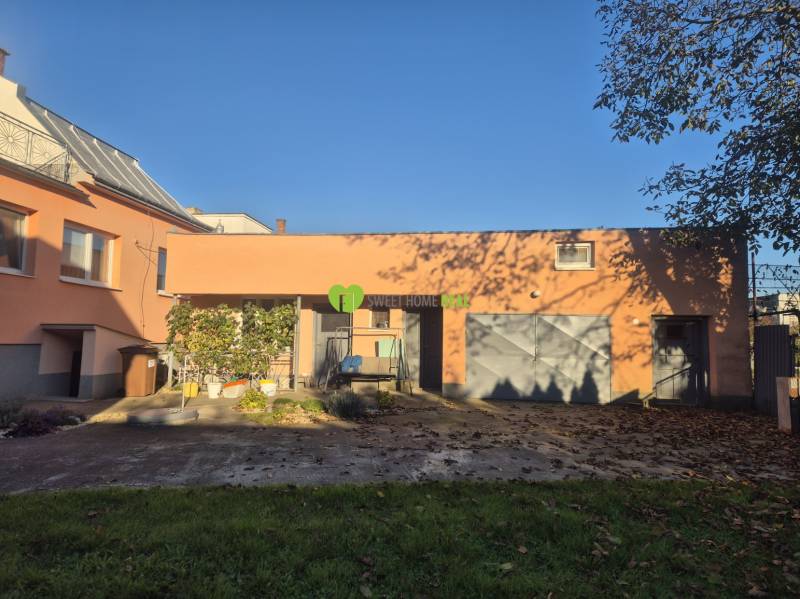 A family house on Kpt. Nálepku Street in Trebišov with a garage and a green yard.