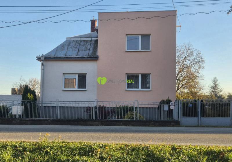 A family house on Kpt. Nálepku Street in Trebišov with a section plastered in beige.