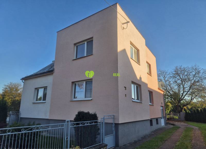 A family house on Kpt. Nálepku Street in Trebišov with a white facade and a garden.