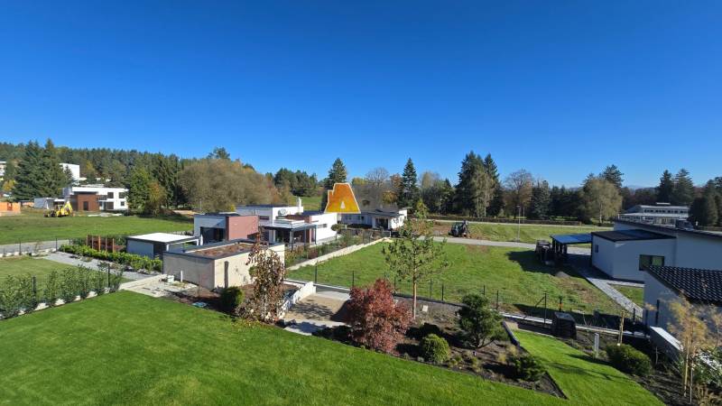 Lands - housing, Kováčová: Gardens, lawns, and houses in a peaceful rural environment.