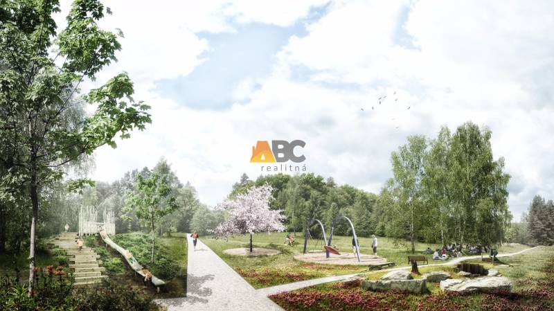 Park in Kováčová with a playground and benches, surrounded by greenery. Plots - residential.