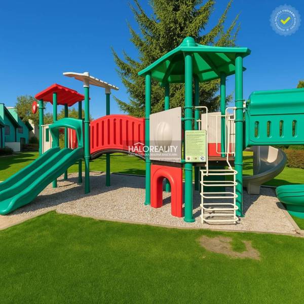 A cottage in Liptovský Mikuláš with a lawn, terrace, and children's playground, under a blue sky.