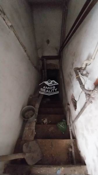 The old staircase leads to the basement in a family house on Štúrova Street.