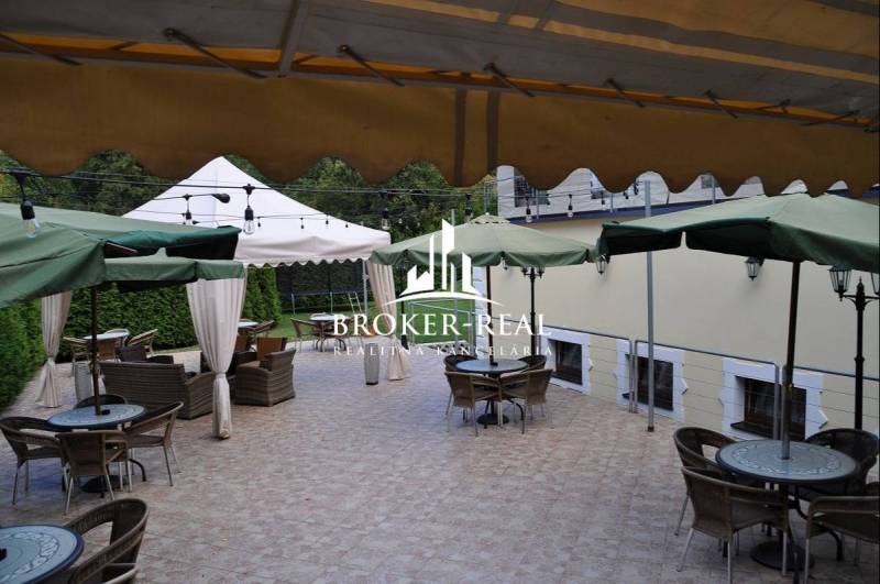 Terrace in Košice - North with seating under umbrellas, suitable for hotels and guesthouses.
