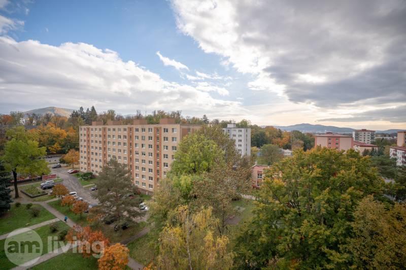 View of apartment buildings in Dubnica nad Váhom on Pod kaštieľom Street in the autumn season.