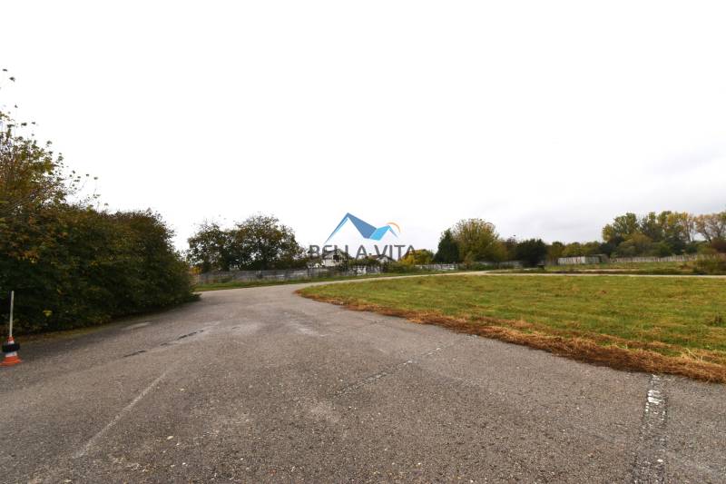 Asphalt road and grassy plots for commercial use in Galanta in Nebojsa.