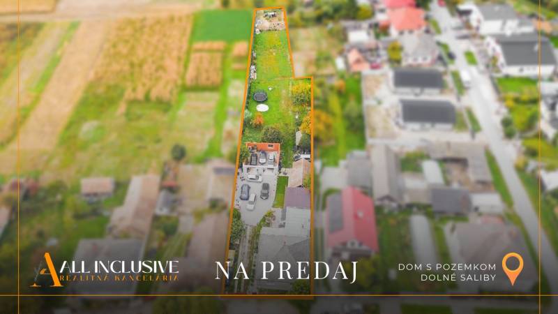 Aerial view of a family house in Dolné Saliby with a large plot of land for sale.