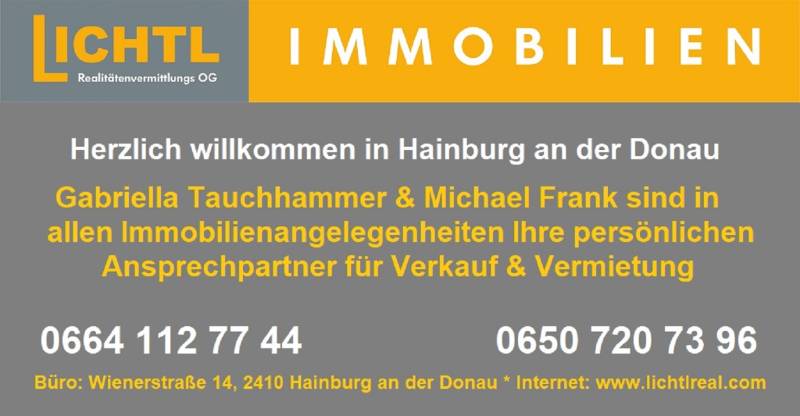 Real estate agency contact information board in Hainburg an der Donau.