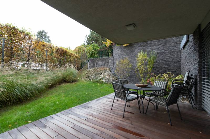 In the garden of a 3-room apartment on Mudroňova Street in Bratislava - Staré Mesto, there is a terrace.