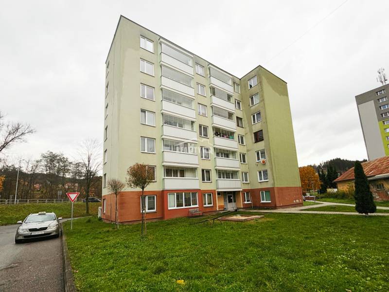 Apartment building on Záhradná Street in Turzovka with a multi-story structure and a garden.
