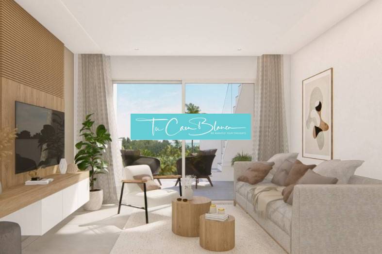 Bright living space with a comfortable sofa and a view from the Holiday Apartment.