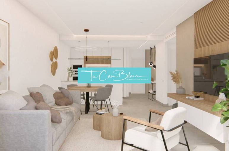 Bright living room of a holiday apartment with a comfortable sofa and wooden decor.