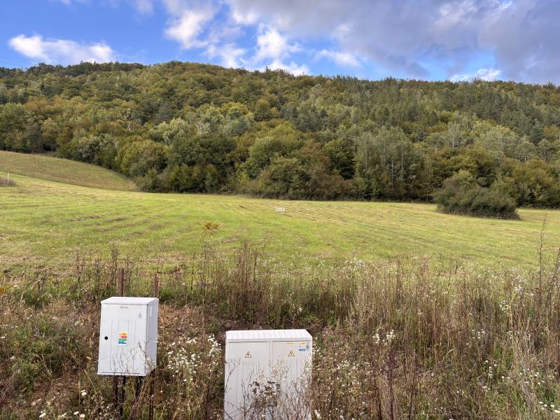 Greenery and electrical boxes on plots in Margecany, ideal for living.