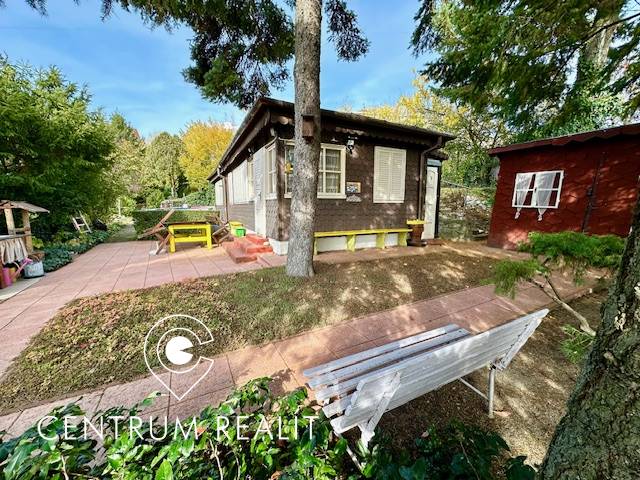 A garden with a cottage on a residential plot in Bratislava - Karlova Ves on Hany Meličkovej.