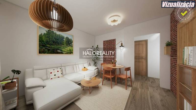 Living room in a three-room apartment with a wooden decor floor and a white sofa.
