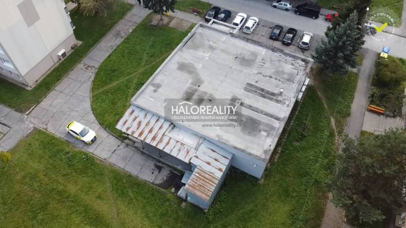 Building of commercial premises in Rimavská Sobota with parking lot and access road.