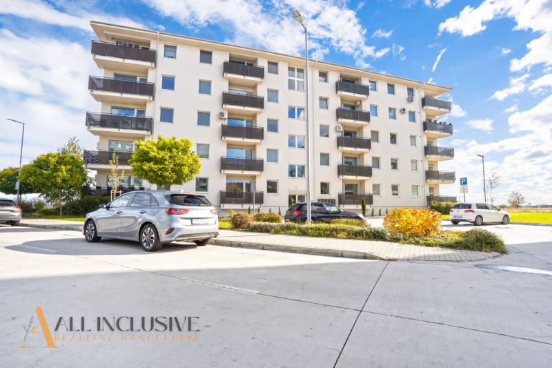 Apartment building on Panónsky Háj in Dunajská Streda with parking and greenery.