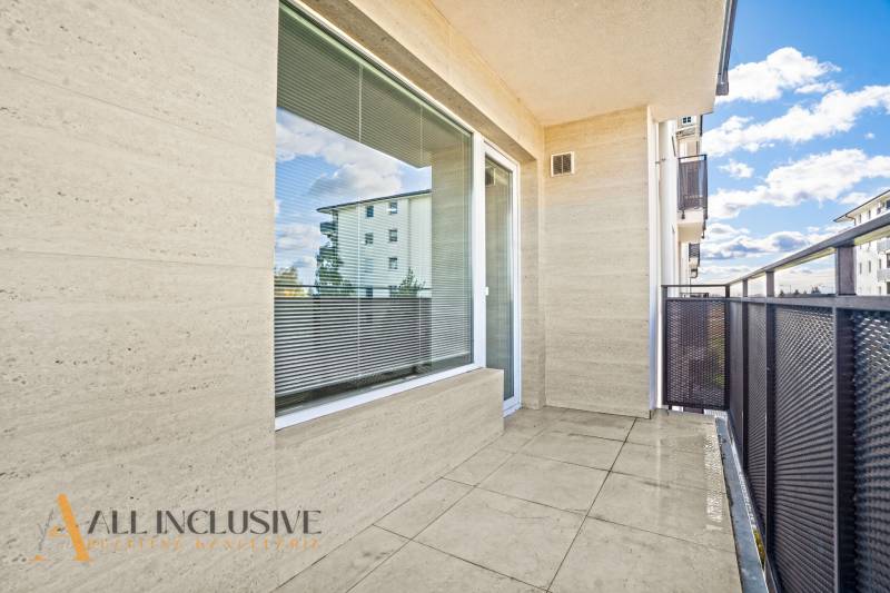 The balcony of a 2-room apartment in Panónsky háj in Dunajská Streda with a view of the surrounding architecture.
