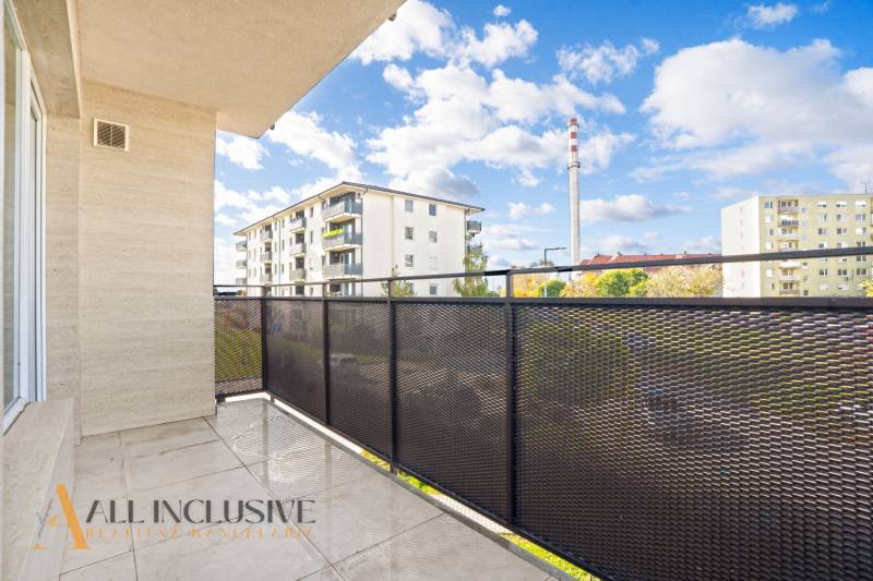The balcony of a 2-room apartment in Panónsky háj in Dunajská Streda with a view of residential buildings.