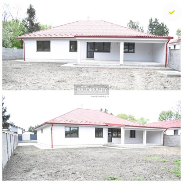 A family house in Závod with a red roof, spacious yard, and covered terrace.