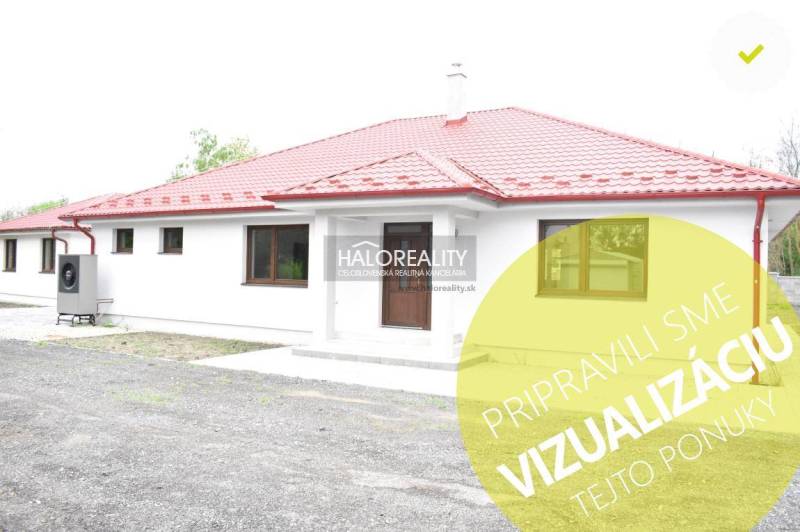 A family house in Závod with a red roof and white facade.