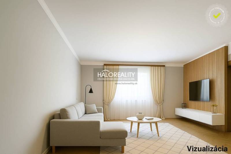 Living room in a family house with a wood-patterned floor and light-colored furniture.