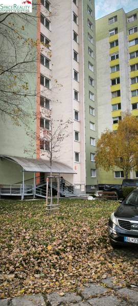 Apartment block on Korytnická Street, Bratislava - Podunajské Biskupice, surrounded by greenery.
