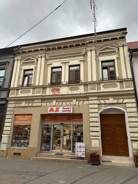 Commercial premises on Mostová Street in Ružomberok with rich architecture and a glass display window.