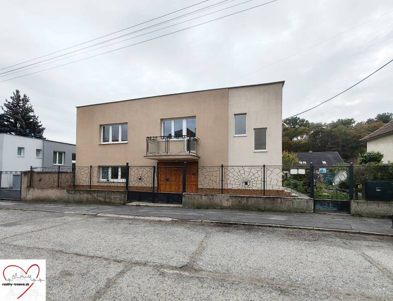A family house on Topoľová Street in Sereď with a simple facade and a garden.