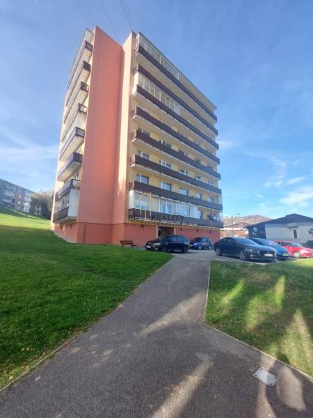 An apartment building in Tvrdošín on Medvedzie Street offers 3-bedroom apartments with parking.