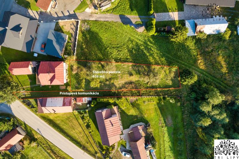 Aerial view of a building plot in Turzovka, Residential land, with access road.