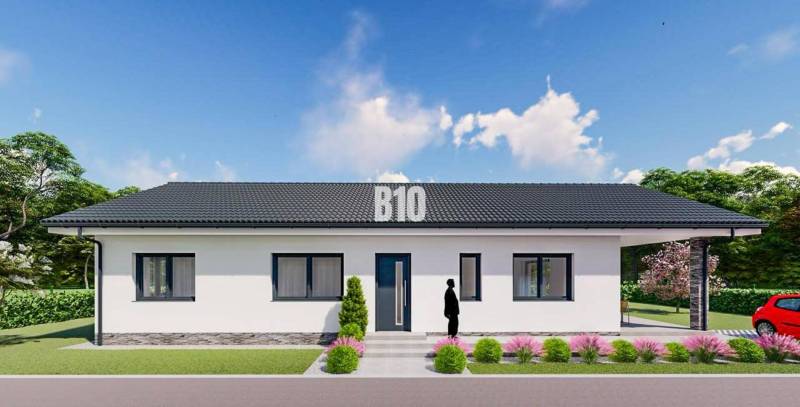 Family house in Čeľadice, residential land, with a landscaped garden and driveway.