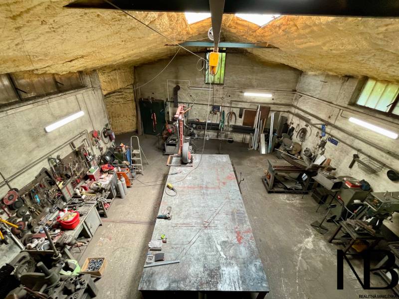 Workshop in a family house with tools and a workbench, Záblatská Street, Trenčín.