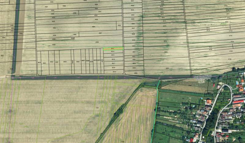 Aerial view of agricultural and forest land plots in Nová Ves nad Váhom.