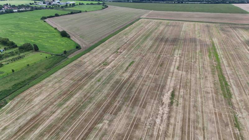 Arable land in agricultural and forest plots, Nová Ves nad Váhom, surrounded by green meadows.