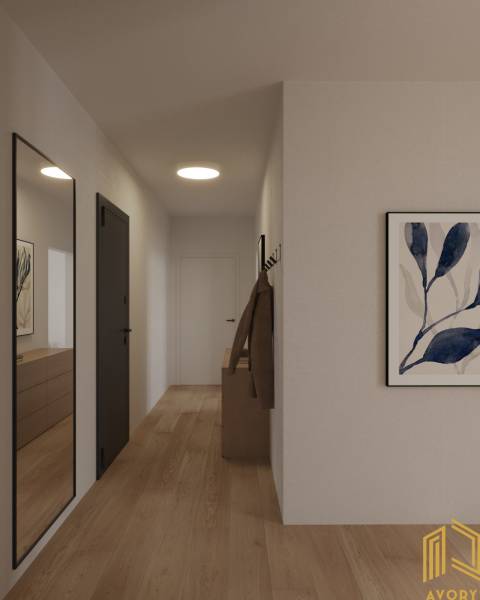 A hallway with a wooden floor, a mirror, and a painting in a 2-room apartment, interior.