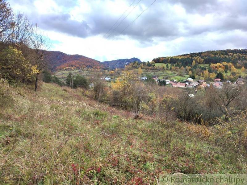Autumn in the Gardens near Hlboké nad Váhom, hills and houses with colorful trees.