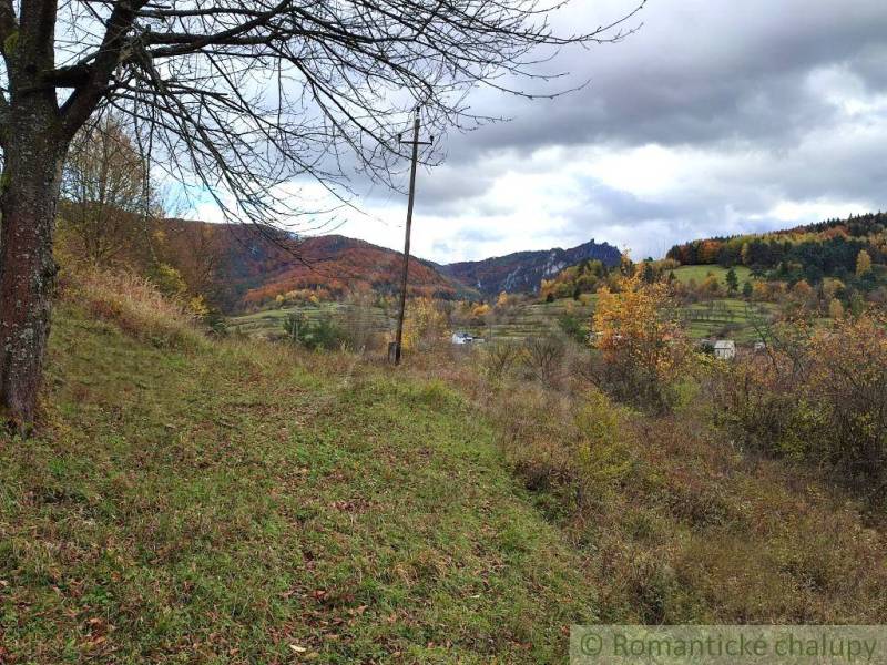Autumn in the Gardens of Hlboké nad Váhom with a view of colorful hills and forests.