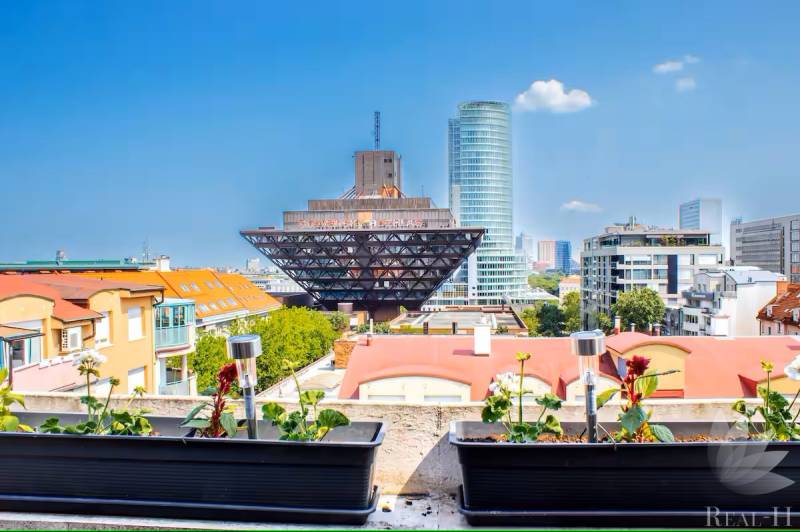View from a 3-room apartment of the Bratislava skyline, including the Slovak Radio Building.