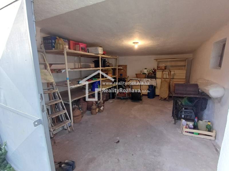 Storage space in a family house with shelves for storage in Dlhá Ves.