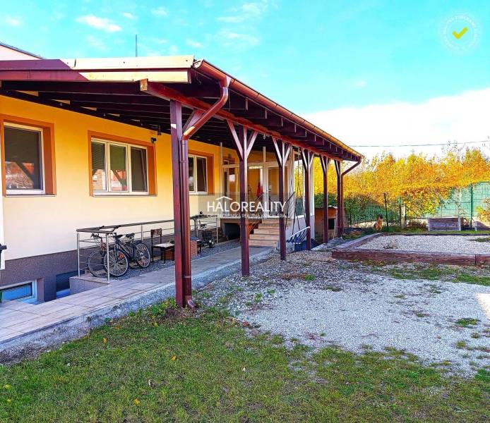 Entrance hall of a 3-room apartment with a large mirror and glass doors.