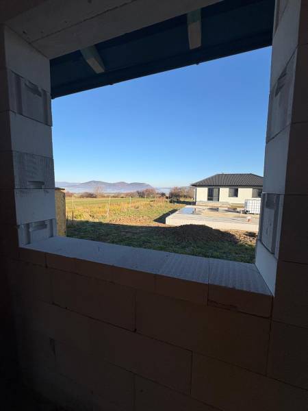 The view from the family house in Vyšná Šebastová of the nature and the neighboring house.