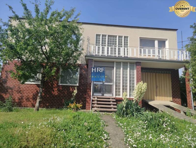Family house on Vieska Street in Radošovce with a brick facade and a garden.
