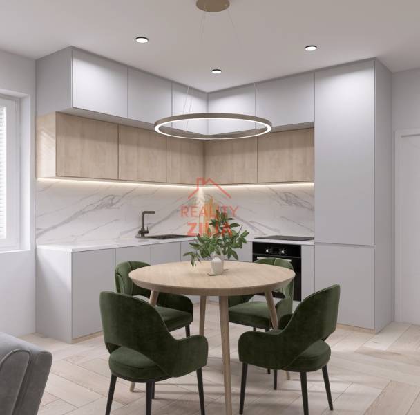 A kitchen in a family house, with marble tiles, green chairs, and a wooden-patterned floor.