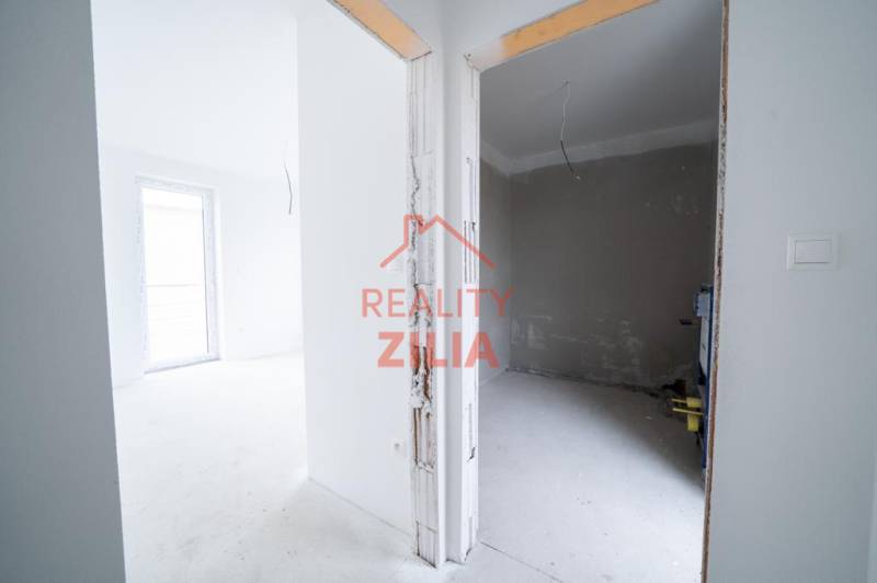 Interior of a family house with two rooms, ready for completion.