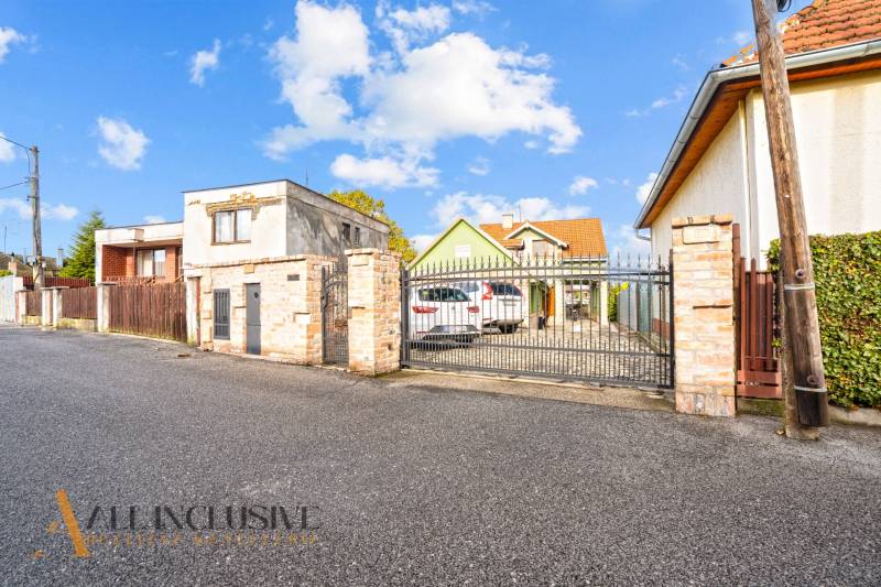 A family house on Kúpeľná Street in Dunajská Streda with a gate and a driveway.