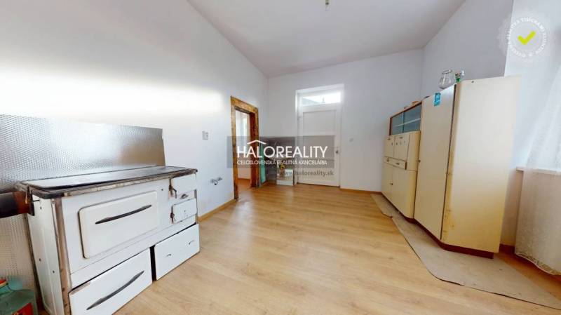 Interior of a family house with tiles and a wooden decor floor.
